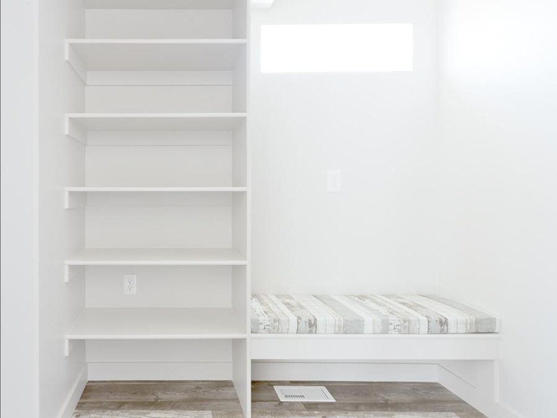 Custom built-in shelving and bench